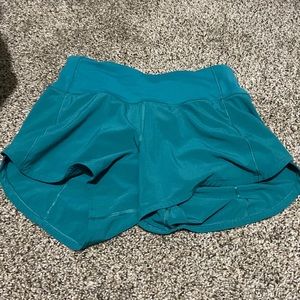 •Teal Lagoon Lululemon Mid Rise Speed Up Shorts 4 Inches Size 0